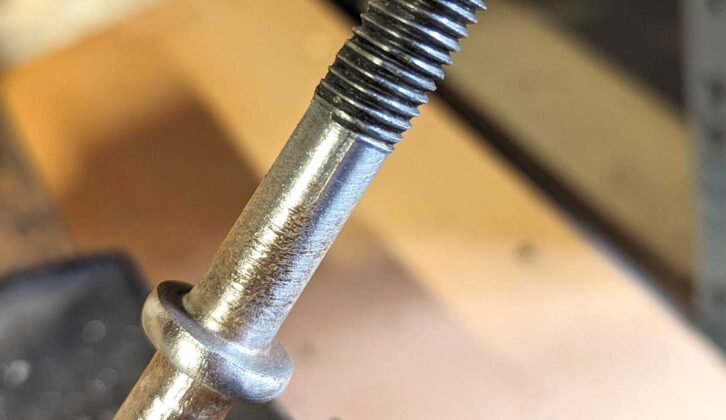 The jockey wheel clamp bolt after being polished