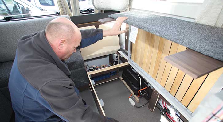 Andy at Downtide Caravans planning how to fit a tracker