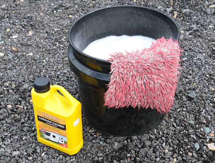 A bucket of soapy water and Fenwick's Caravan Cleaner