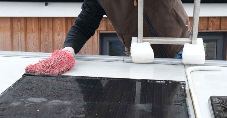 Using a microfibre mitt on the roof