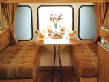 Lounge and seating in typical 1980s caravan