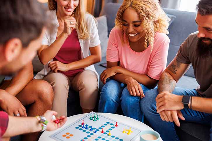 People playing a board game