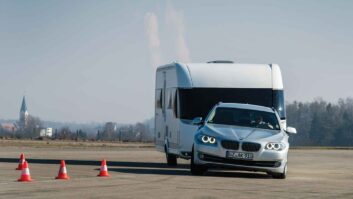 A car towing a caravan during a road test