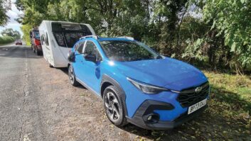 The Subaru Crosstrek 2.0i Touring hitched up to a Swift caravan